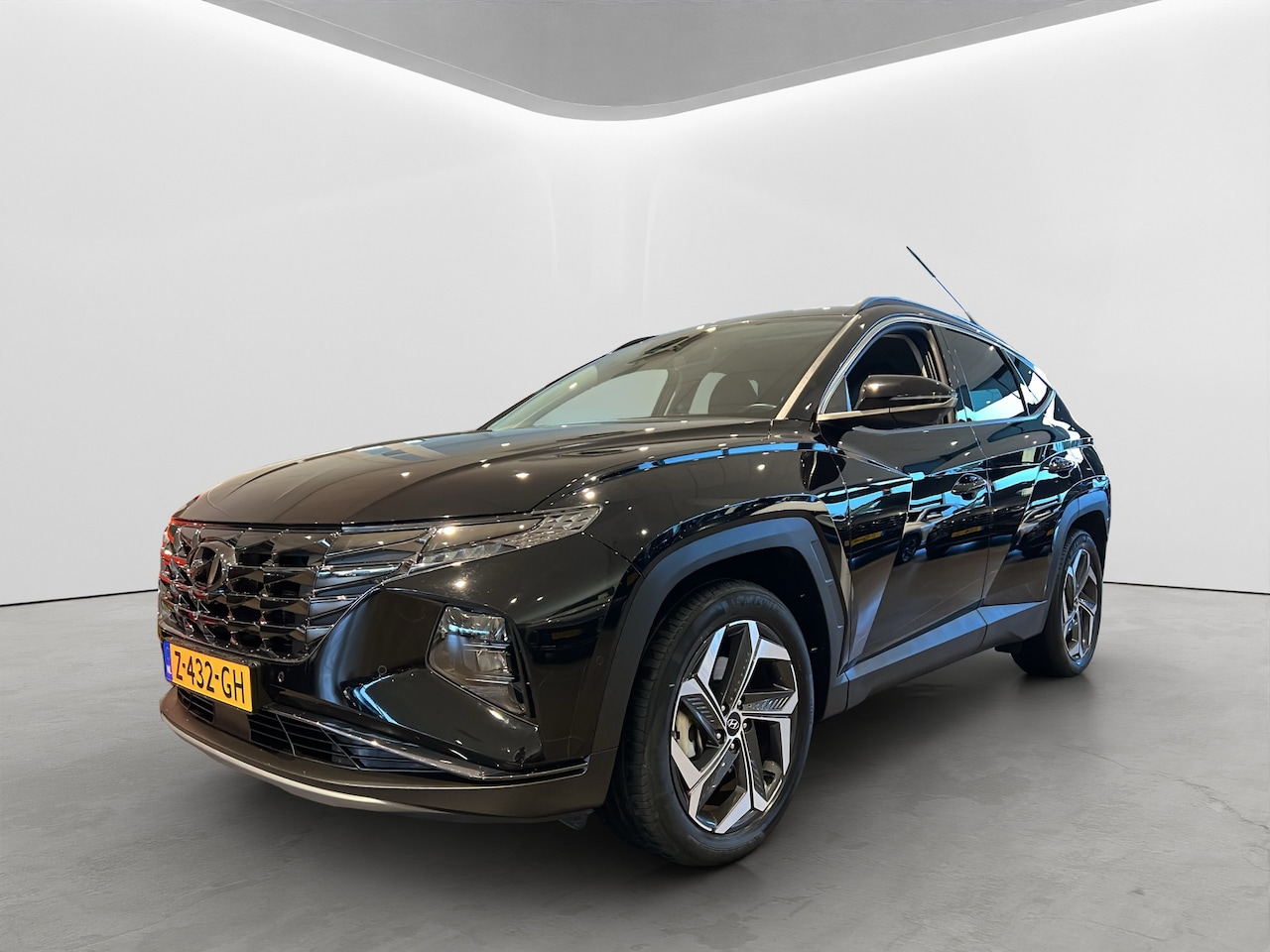 Hyundai Tucson - 1.6 T-GDI 265pk PHEV Premium 4WD (299,- p/m Demo Deal!) | Leder | Carplay | Climate | Keyl - AutoWereld.nl