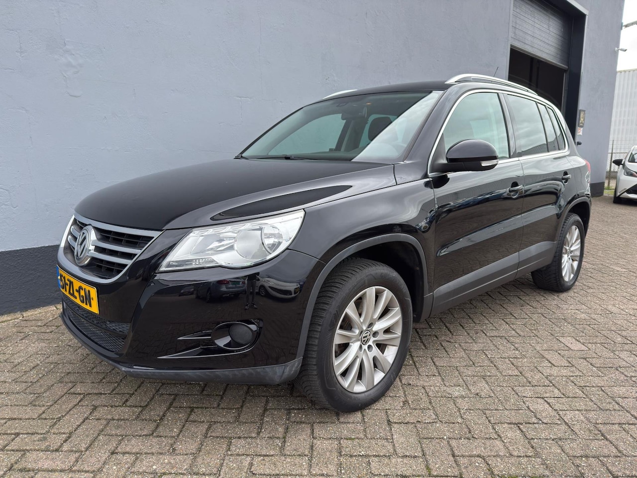 Volkswagen Tiguan - 1.4 TSI Sport&Style 4Motion - Trekhaak - AutoWereld.nl