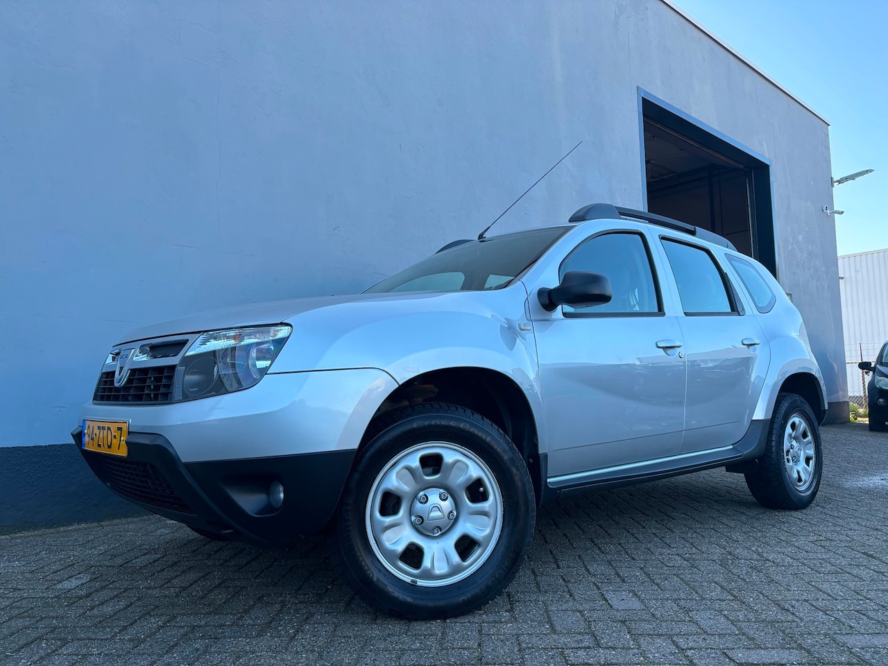 Dacia Duster - 1.6 Lauréate 2wd - Trekhaak - AutoWereld.nl