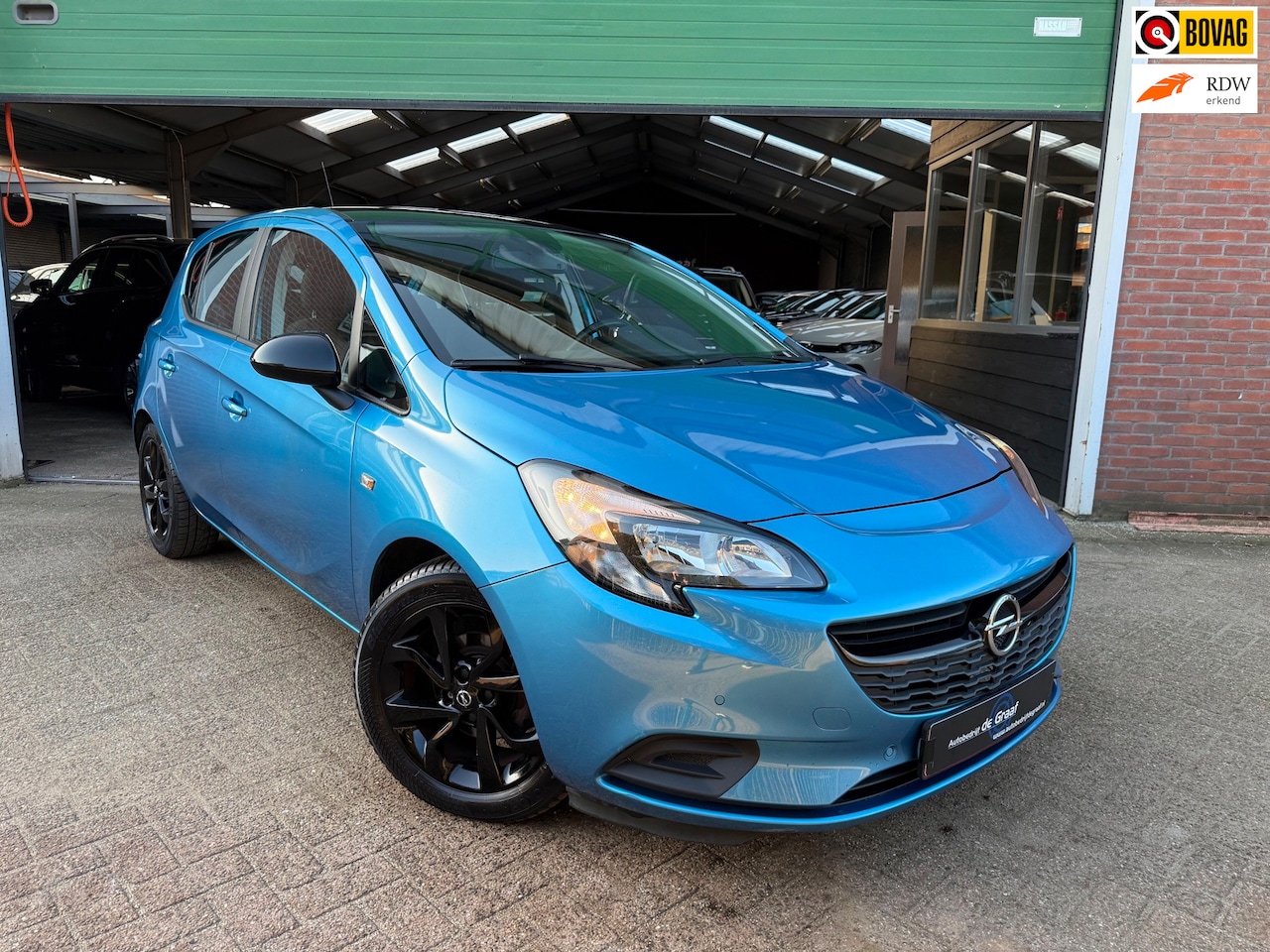 Opel Corsa - 1.4 Black Edition|CRUISE/PDC/CARPLAY/ - AutoWereld.nl