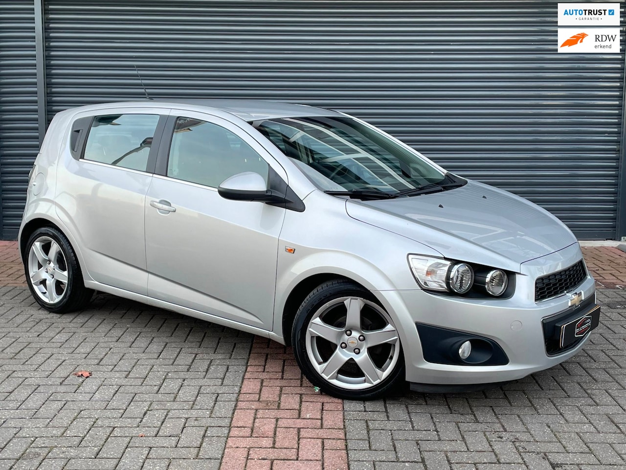 Chevrolet Aveo - 1.4 LTZ Parkeersensor | Cruise | Bluetooth | Airco - AutoWereld.nl