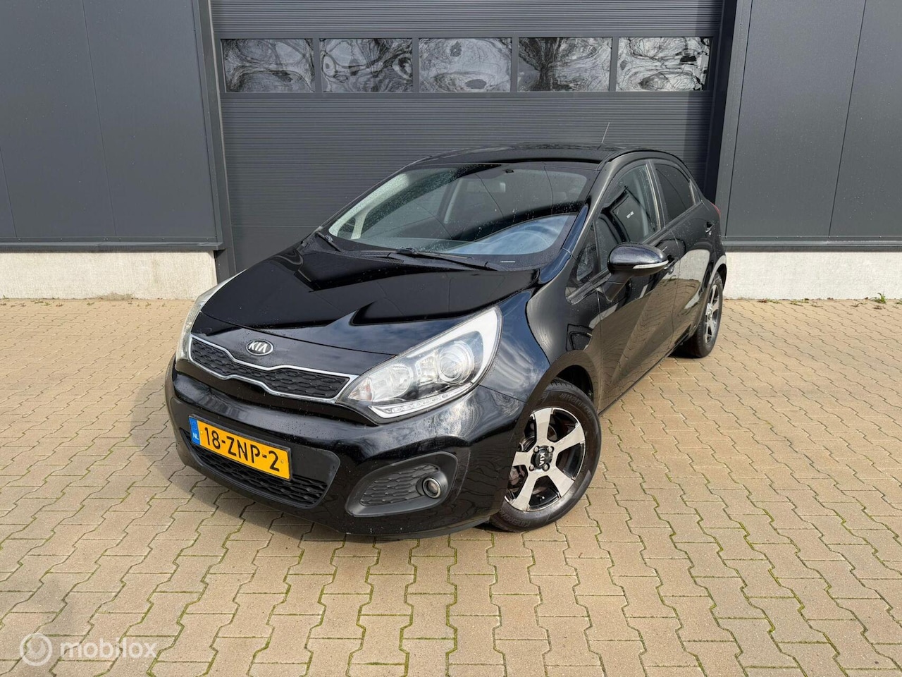Kia Rio - 1.2 CVVT Design Edition Airco Nw APK 03/27 Cruise C - AutoWereld.nl