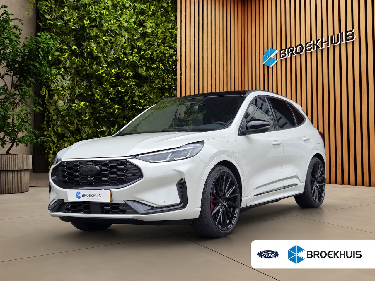 Ford Kuga - 2.5 PHEV Broekhuis Black Sound Edition | Uniek! | Pano | Trekhaak | Verlaagd | Gordels in - AutoWereld.nl