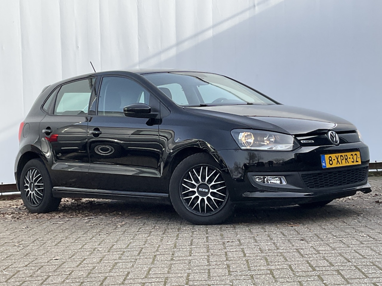 Volkswagen Polo - 1.4 TDI BlueMotion Navi Airco Cruise 5 Deurs - AutoWereld.nl
