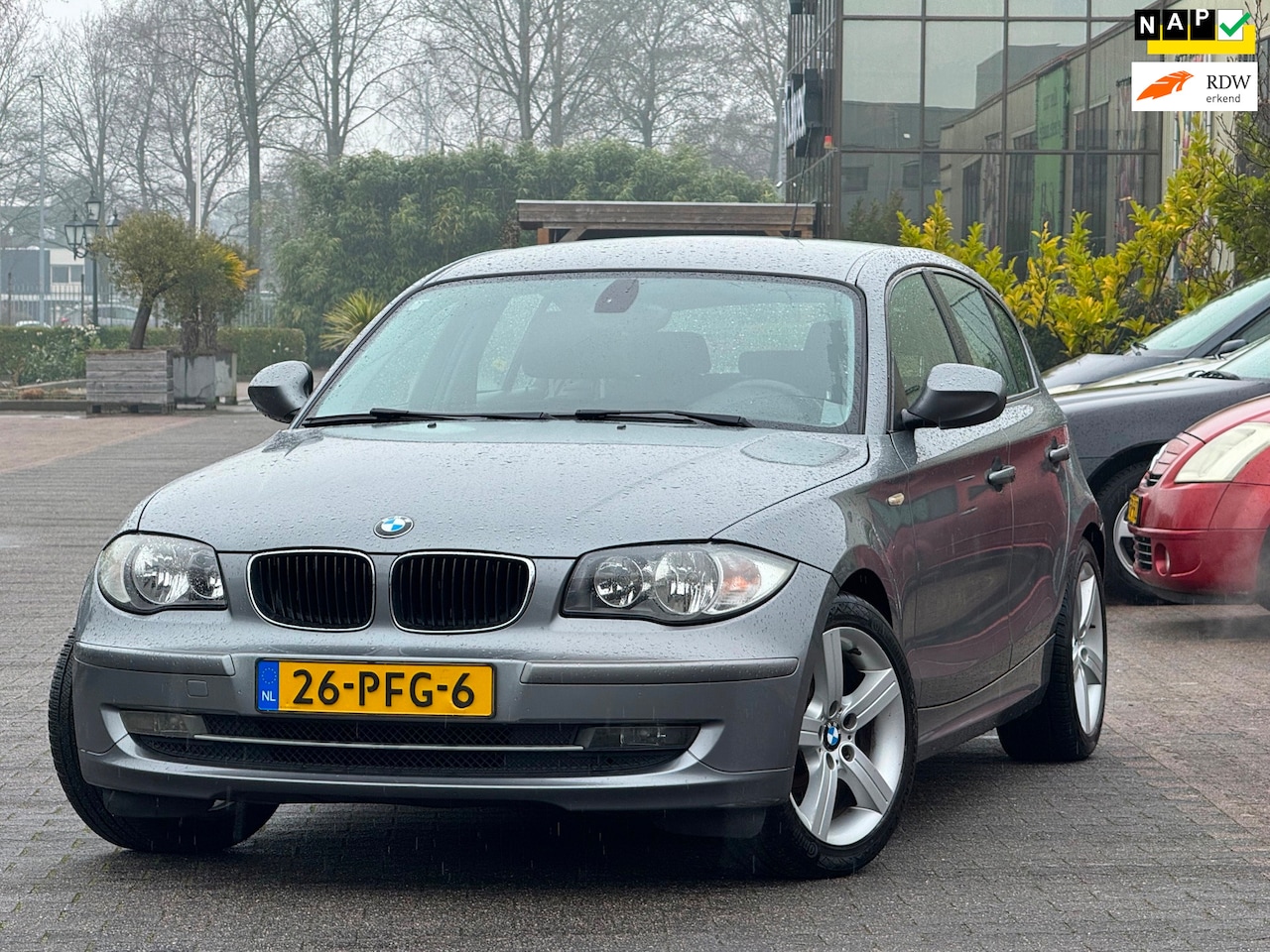 BMW 1-serie - 118i Business Line | Climate control | Cruise control | LM velgen 17 inch | 2 sleutels | O - AutoWereld.nl