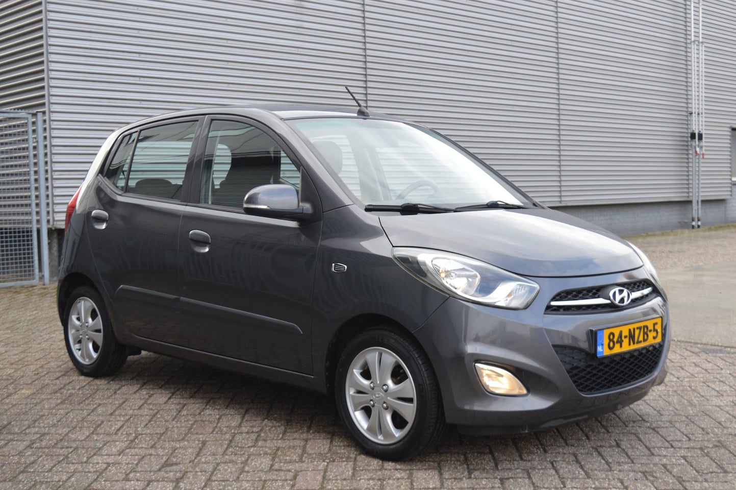 Hyundai i10 - 1.25i i-Catcher bj10 airco elec pak 76468 KM NAP - AutoWereld.nl