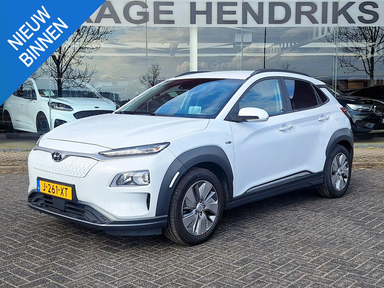 Hyundai Kona Electric - EV Fashion 64 kWh | SOH: nnb | 3 Fase | Warmtepomp | HUD | Navi | Adaptive CC | Blindspot - AutoWereld.nl