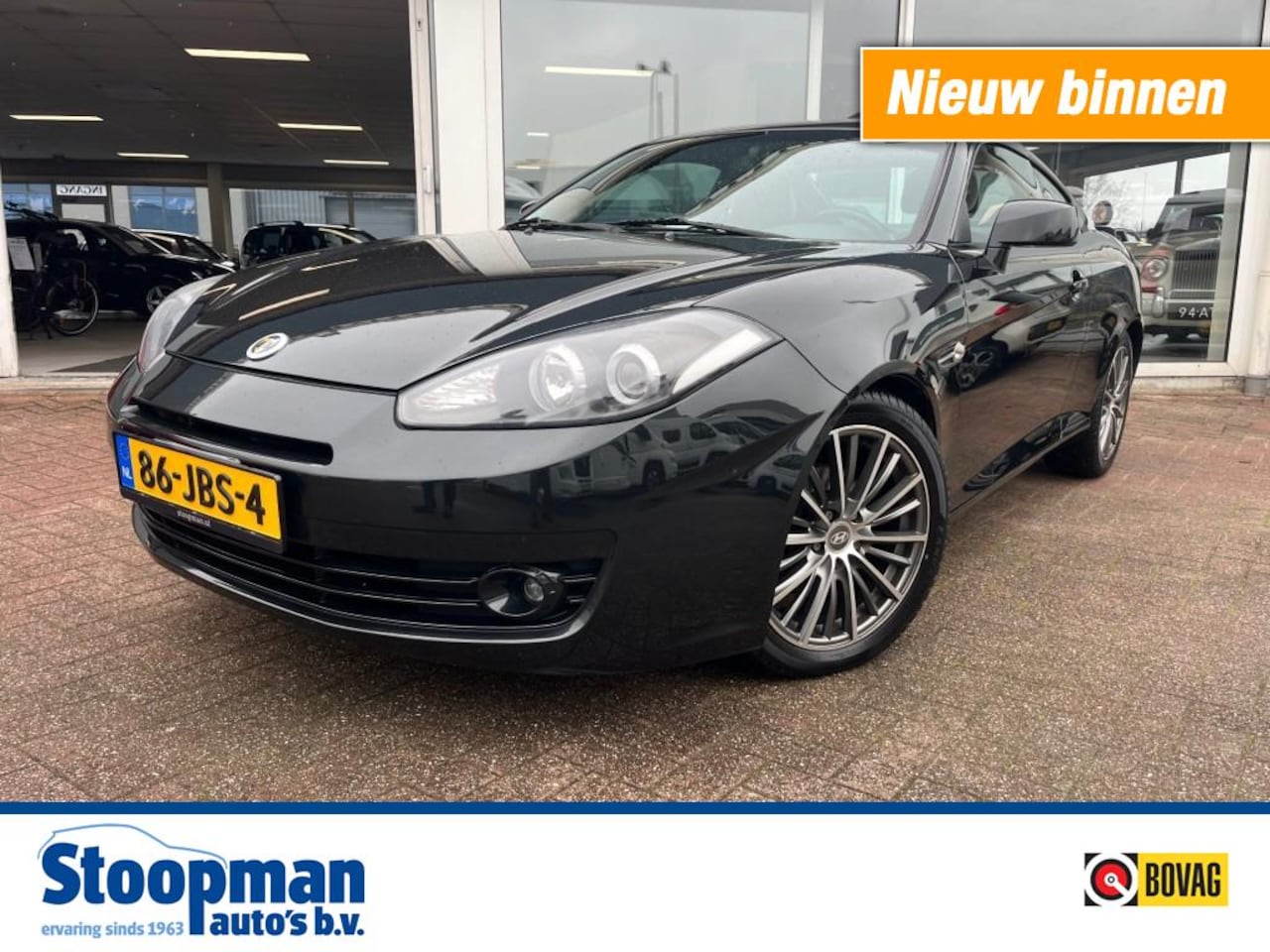 Hyundai Coupé - 2.0i Dynamic Clima Cruise Leder Stoelv. - AutoWereld.nl