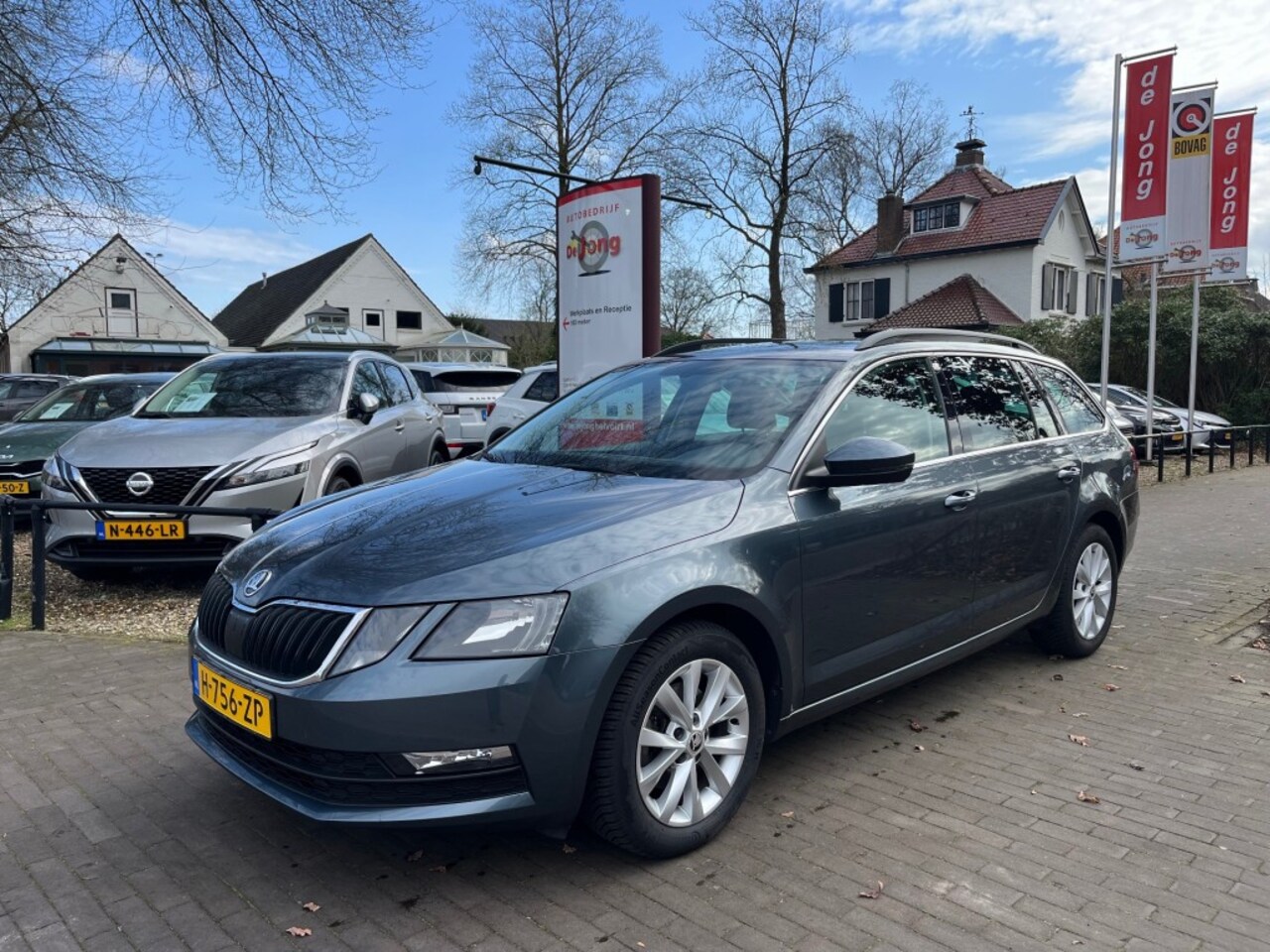Skoda Octavia Combi - COMBI 1.0 TSI / NAVI / CARPLAY / TREKHAAK / CRUISE CTR. / STOELVERWARMING - AutoWereld.nl