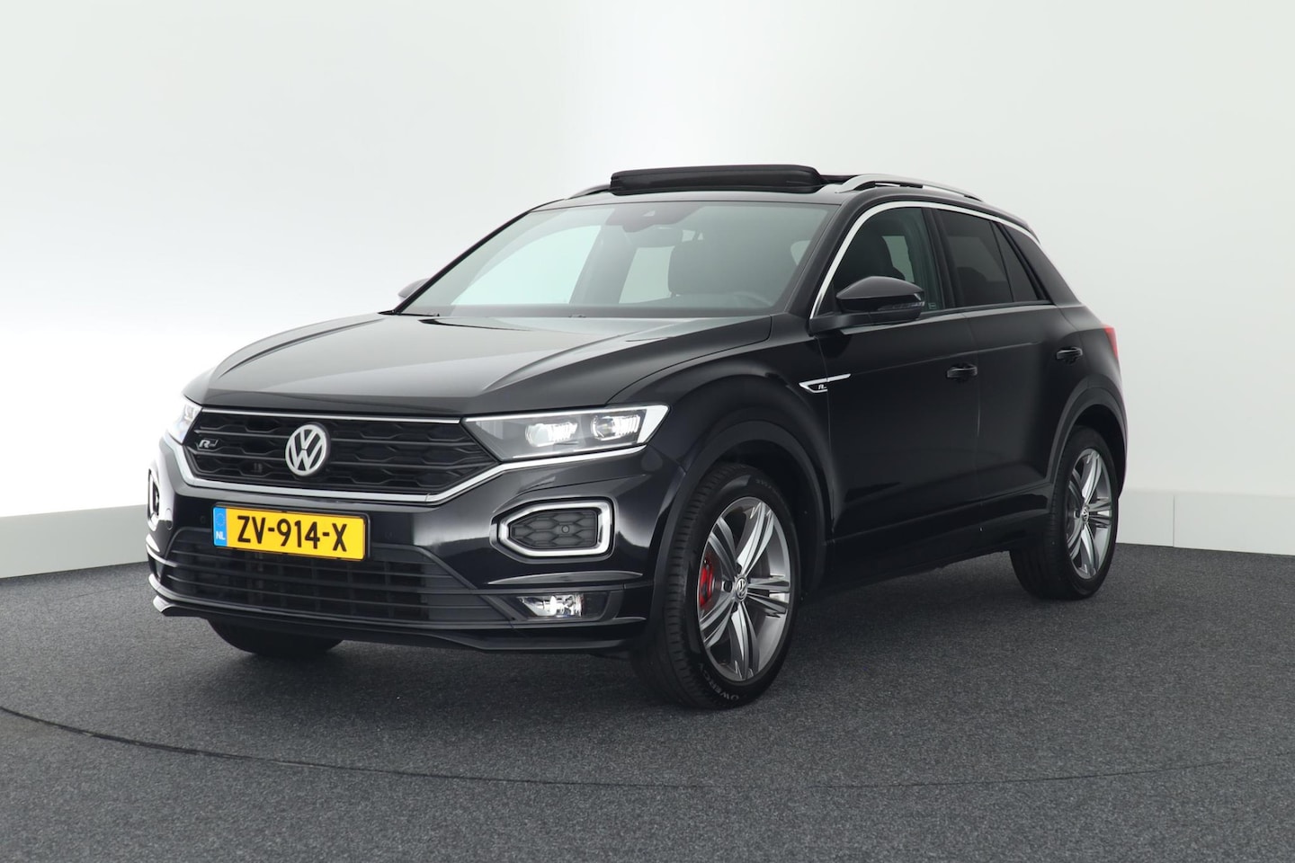 Volkswagen T-Roc - 1.5 TSI 150pk DSG R-Line Sport Panoramadak Camera Leder Navigatie Virtual Cockpit - AutoWereld.nl