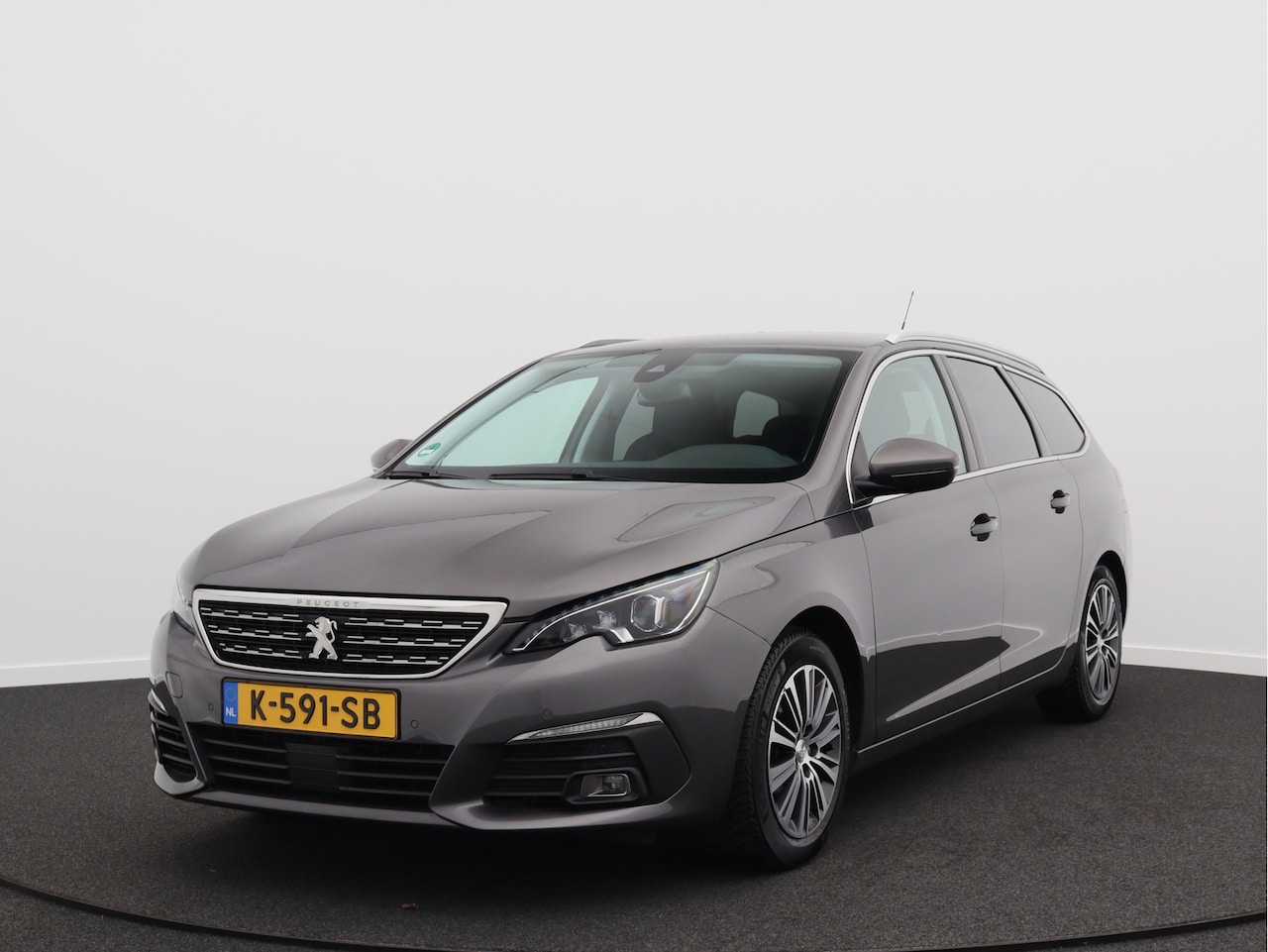 Peugeot 308 SW - 1.2 PureTech Blue Lease Allure/ lage km/ zeer mooi! - AutoWereld.nl