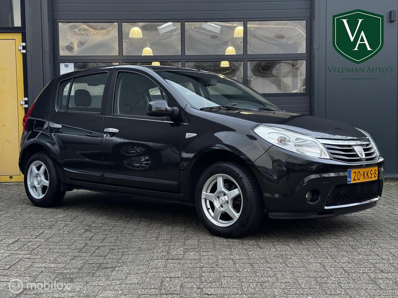 Dacia Sandero - 1.2 Lauréate | Airco | trekhaak - AutoWereld.nl