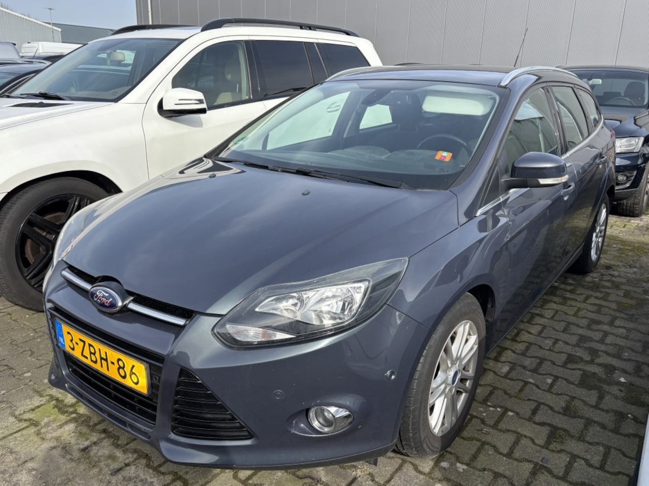 Ford Focus Wagon - 1.0 EcoBoost 2014 EXPORT MOTORSCHADE - AutoWereld.nl
