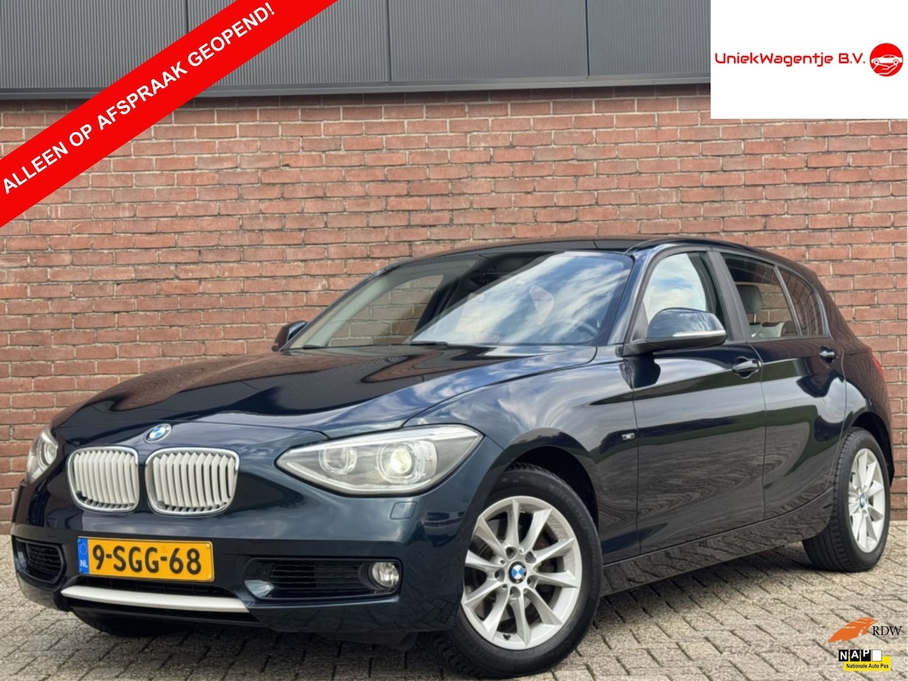 BMW 1-serie - 118i EXECUTIVE | NL-AUTO! | LEDER! | XENON! - AutoWereld.nl