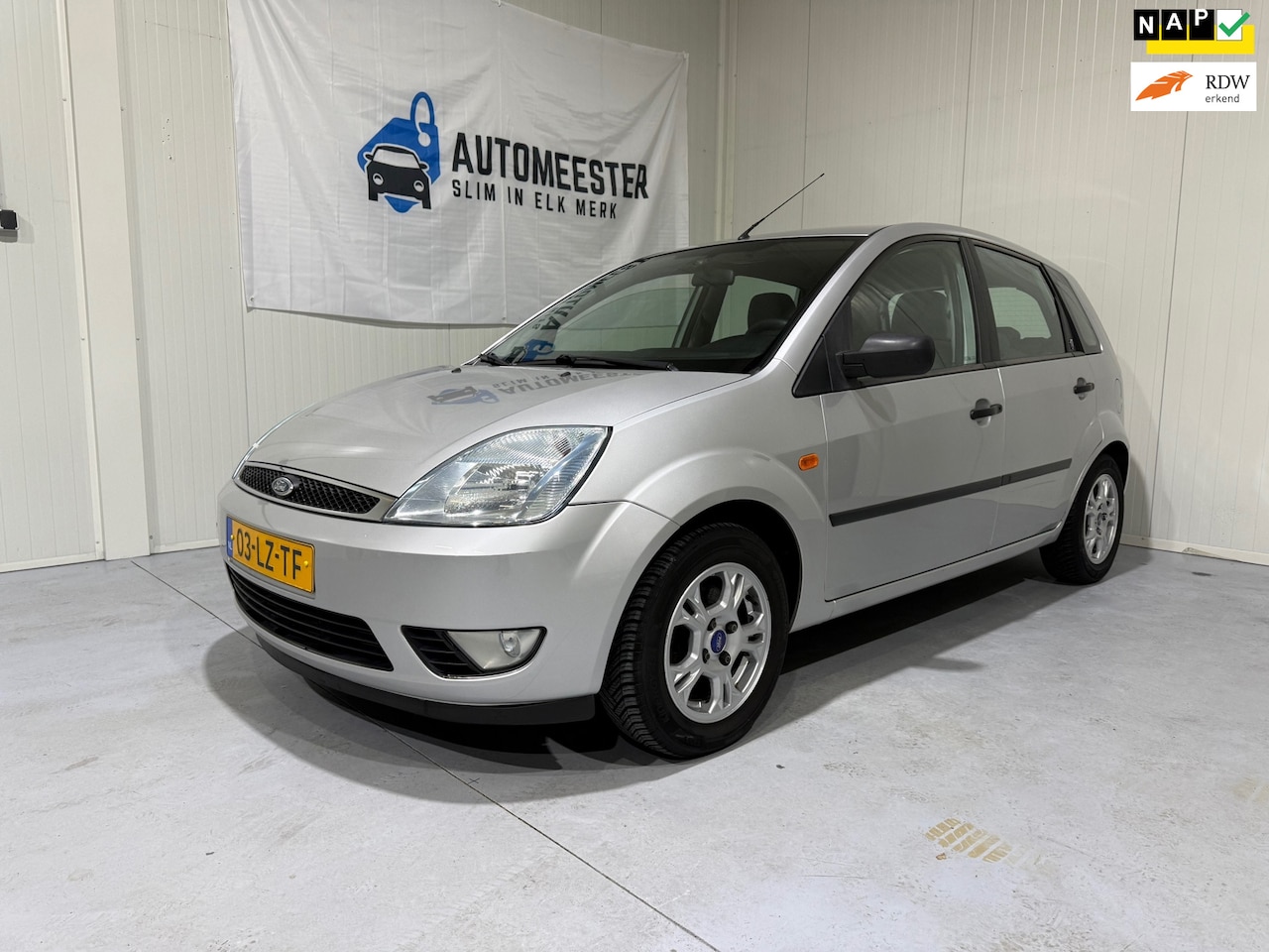 Ford Fiesta - 1.4-16V Ghia - Airco - Elektrische ramen - Voorruit verwarming - AutoWereld.nl
