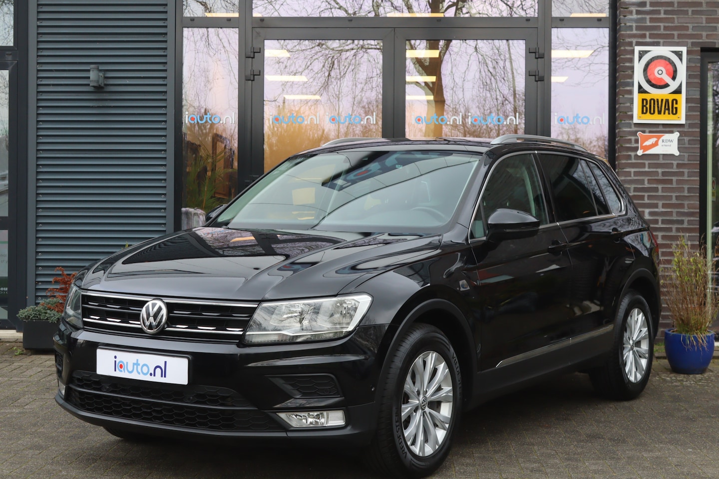 Volkswagen Tiguan - 1.4 TSI ACT 150PK DSG Comfortline Navi/Camera/ECC/ACC/17"/Trekhaak wegkl. - AutoWereld.nl