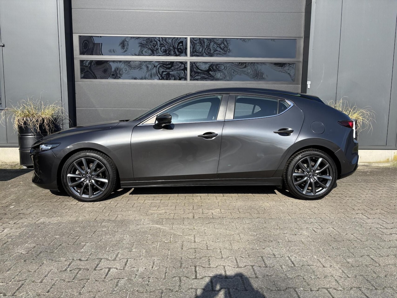 Mazda 3 - 2.0 e-SkyActiv-G M Hybrid 122 Luxury AppleCarPlay/ AndroidAuto/ stuurwielverwarming/ stoel