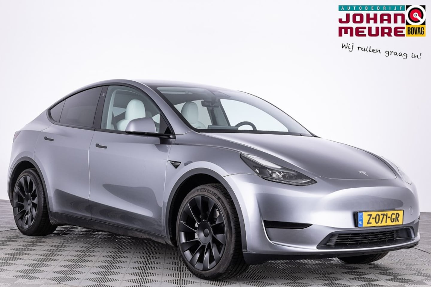 Tesla Model Y - RWD 58 kWh | PANORAMADAK | LEDER - AutoWereld.nl