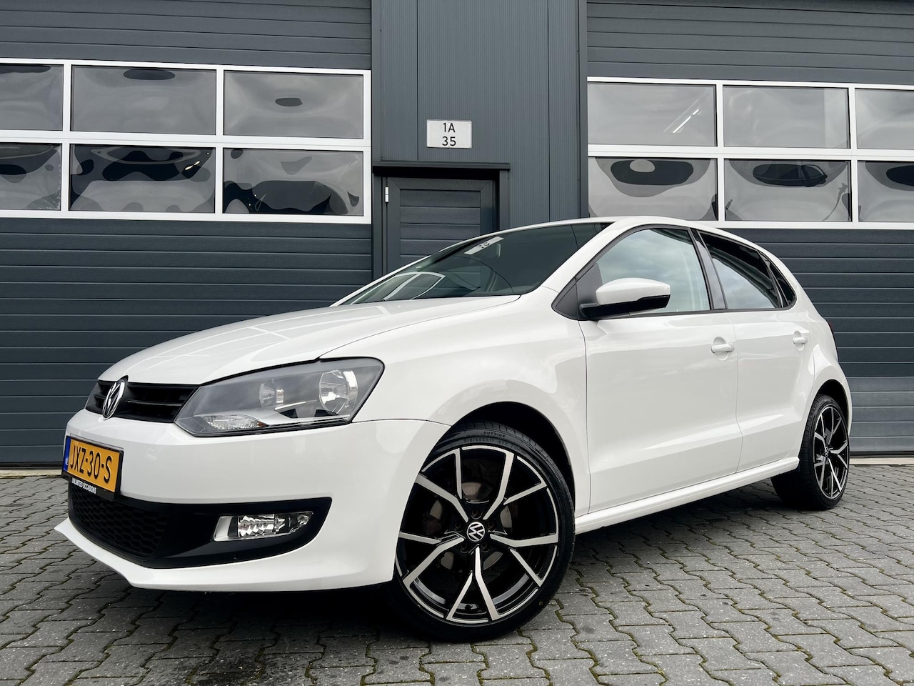 Volkswagen Polo - 1.2-12V Comfortline *CARPLAY*PDC*AIRCO - AutoWereld.nl