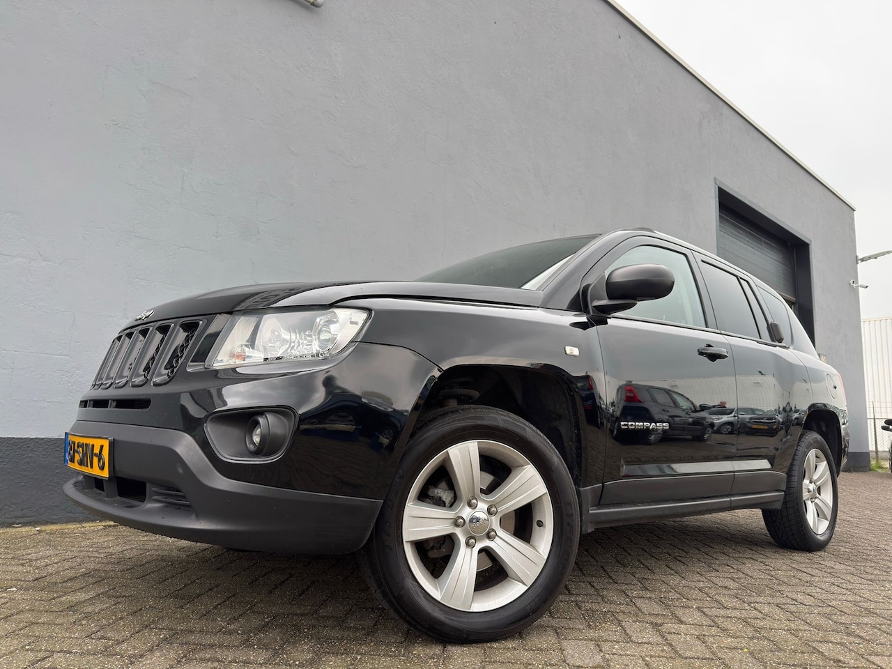 Jeep Compass - 2.0 Sport - Airco - Navigatie - AutoWereld.nl