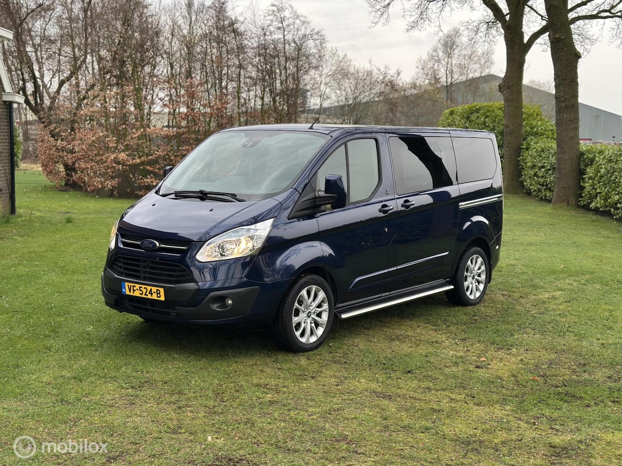 Ford Transit Custom - 2.2 TDCI 155pk L1H1 Champions Edition DC - AutoWereld.nl