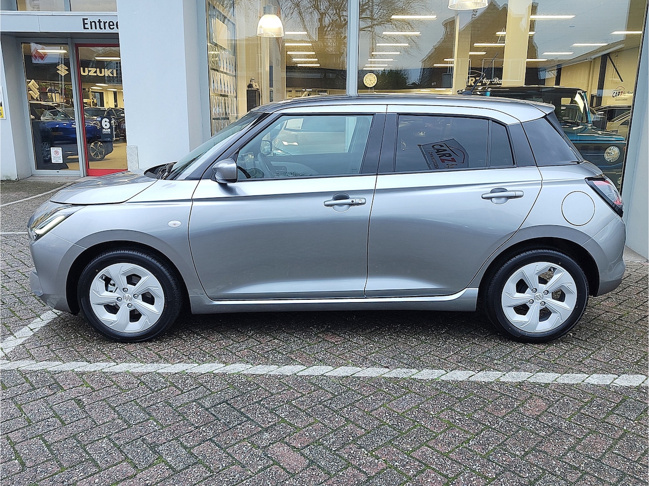 Suzuki Swift - 1.2 SELECT SMART HYBRID AUTOMAAT Direct Leverbaar | Tot 10 JAAR GARANTIE! | Inclusief € 1. - AutoWereld.nl