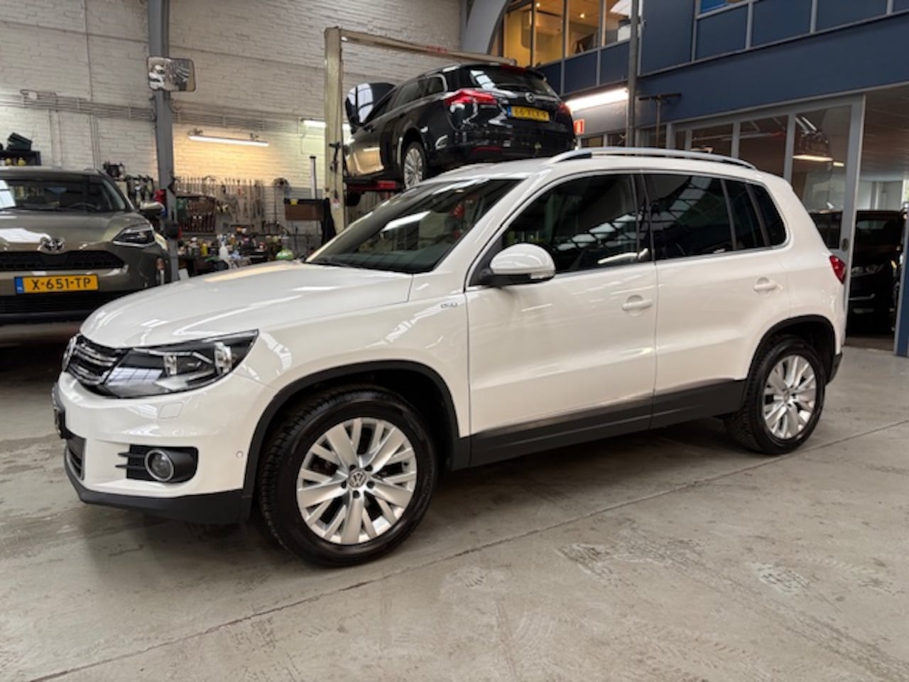 Volkswagen Tiguan - 1.4 TSI 160pk Sport & Style | Apple carplay/ Android auto | Trekhaak | Stoelverw. | Pdc v+ - AutoWereld.nl