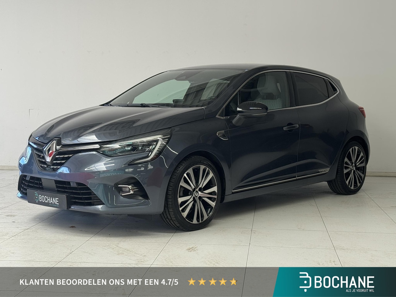 Renault Clio - 1.6 E-Tech Hybrid 140 Initiale Paris | Leder | BOSE-Audiosysteem | Stoelverwarming | Navig - AutoWereld.nl
