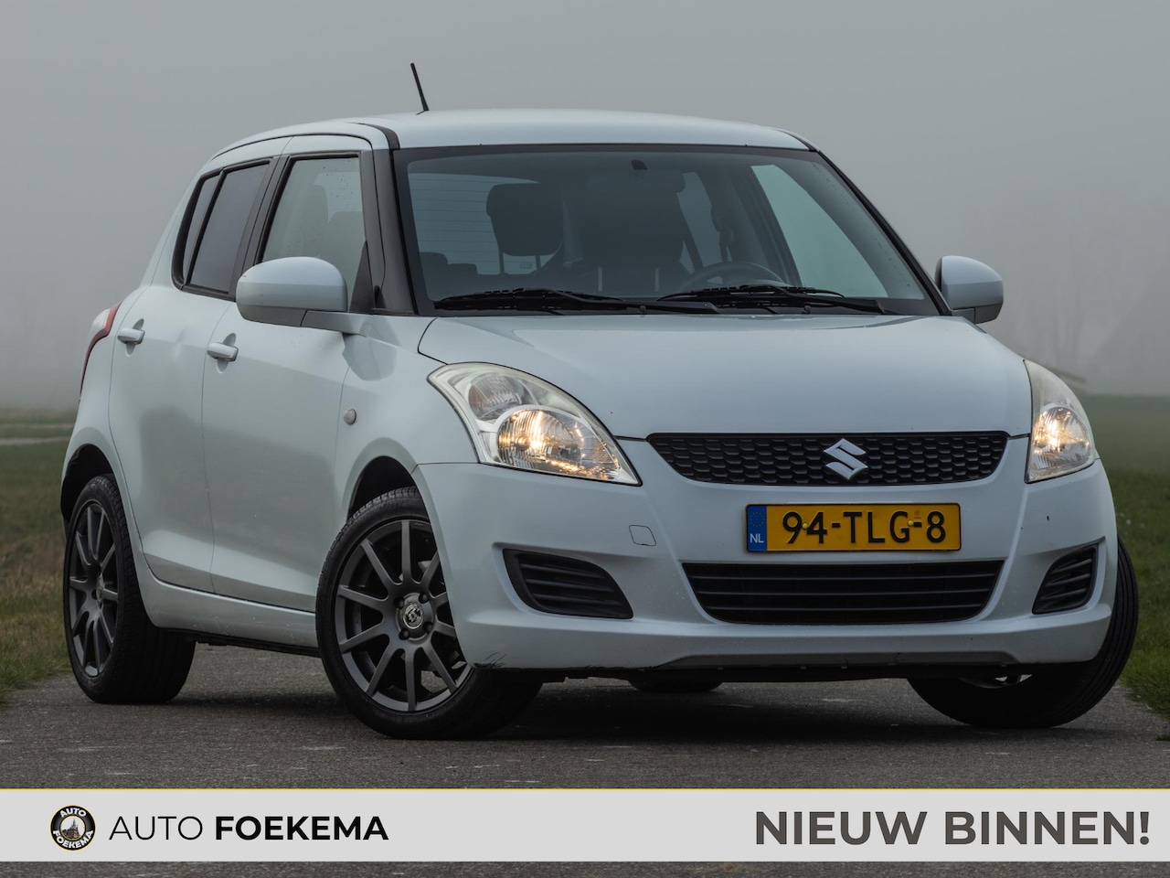 Suzuki Swift - 1.2 Comfort EASSS Cruise control Stoelverwarming - AutoWereld.nl