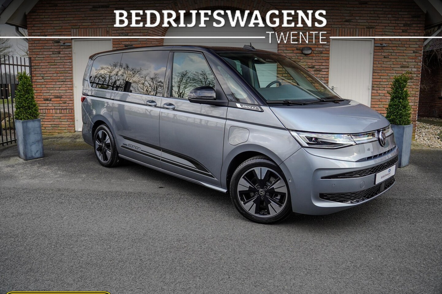 Volkswagen Multivan - 1.5I E-hybrid Edition L2 4x4 Panoramadak Leder Trekhaak Area view 19'' Lichtmetalen velgen - AutoWereld.nl