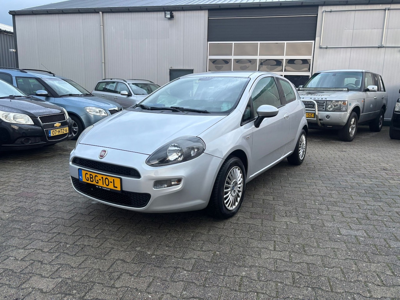 Fiat Punto Evo - 1.2 Pop 2012 Airco APK 114.000 KM - AutoWereld.nl