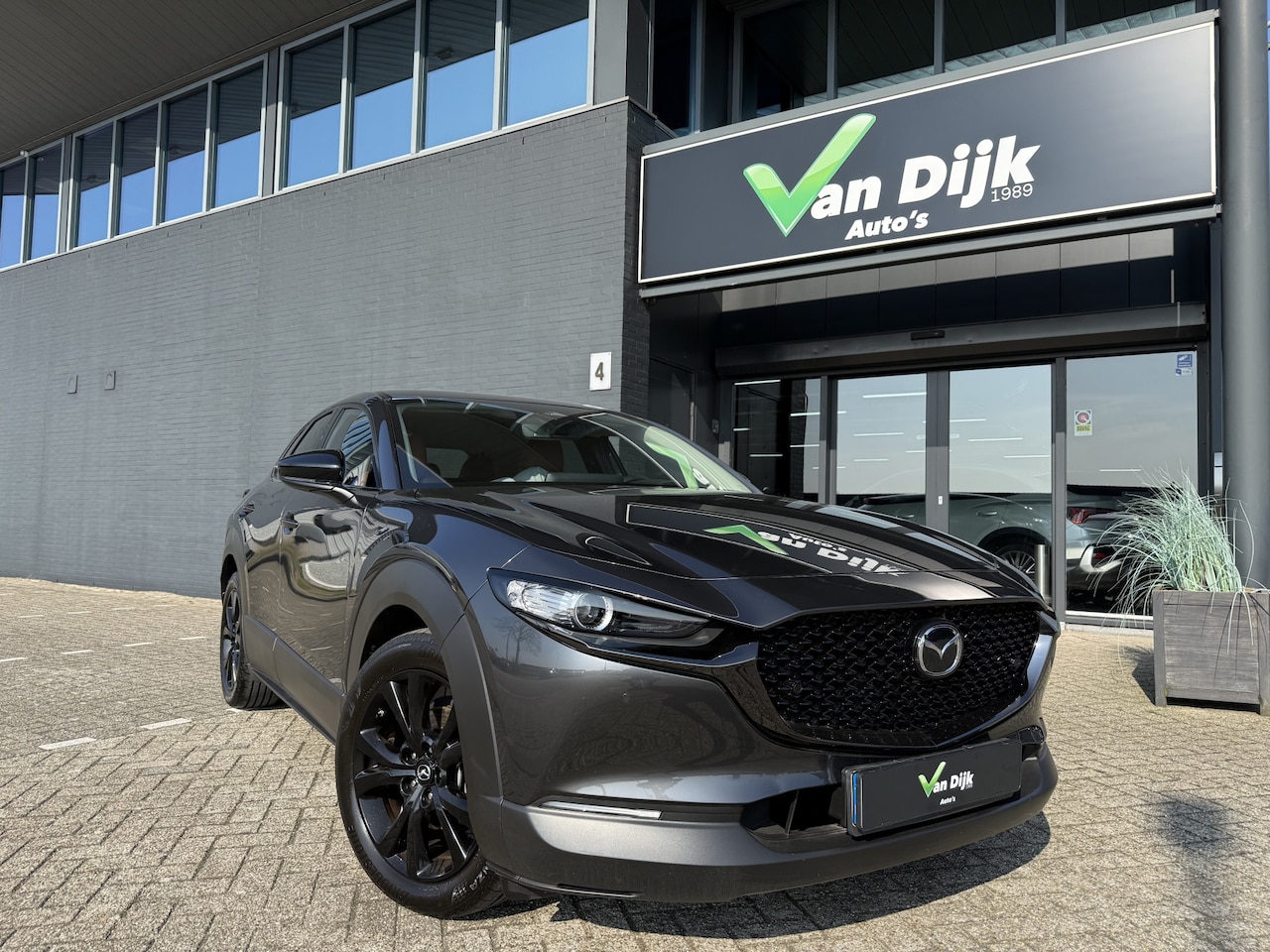 Mazda CX-30 - 2.0 e-M Hybrid Nagisa Leer Navi Camera El.Klep Bose - AutoWereld.nl