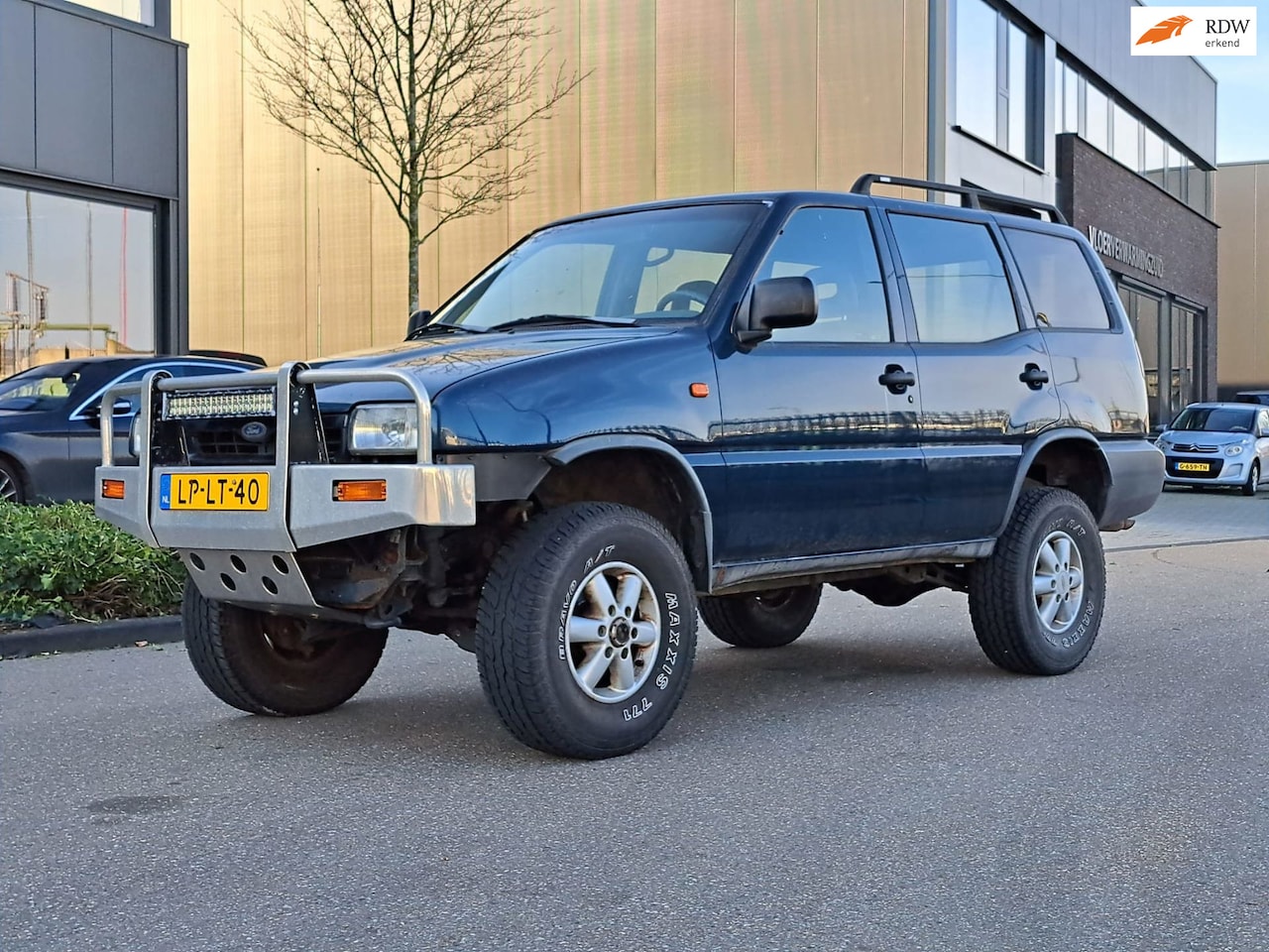 Ford Maverick - 2.4 LWB GLX Export - AutoWereld.nl