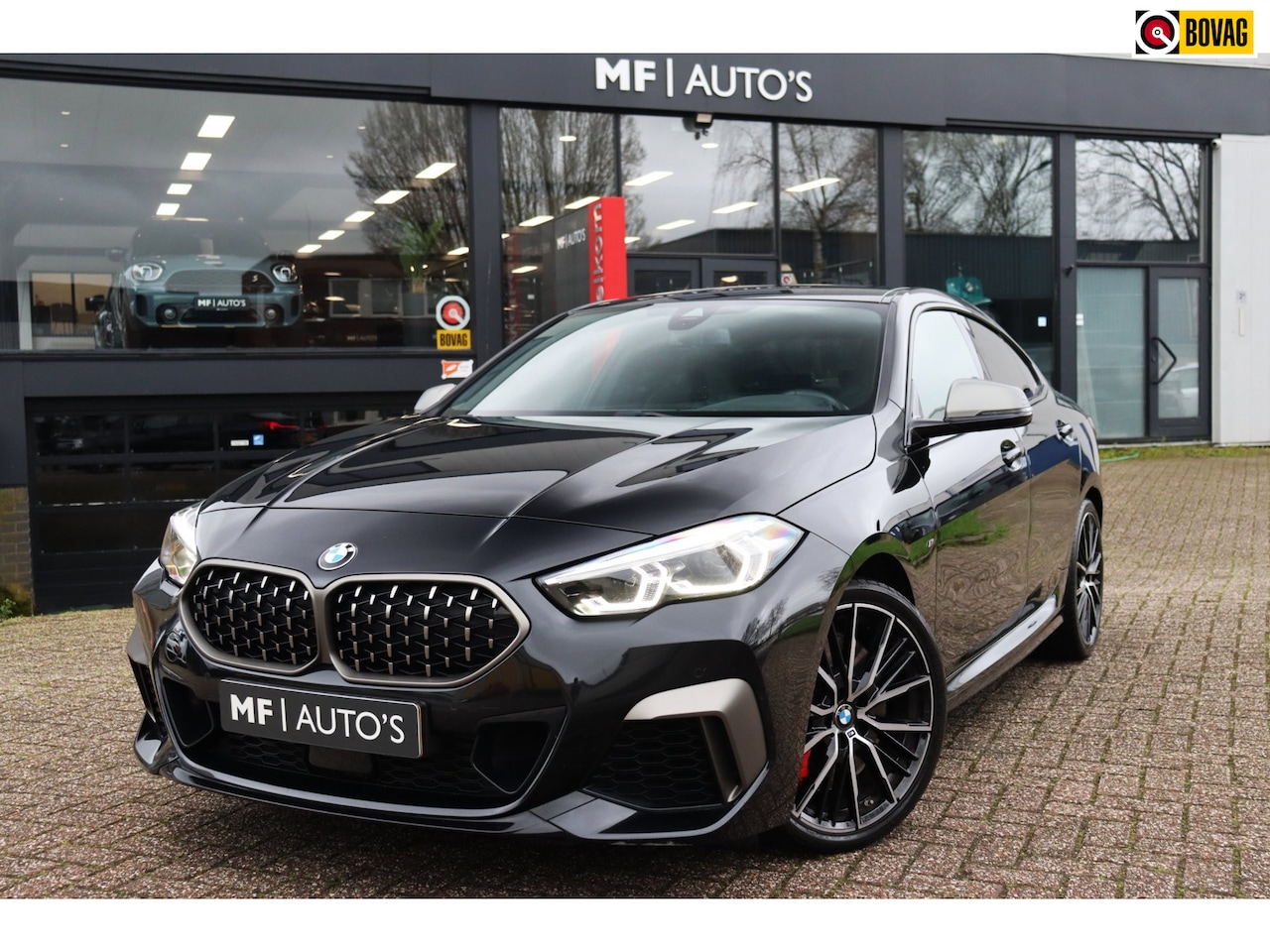 BMW 2-serie Gran Coupé - M235i xDrive High Executive Edition|H&K|Leder|Schaalstoel|Keyless|NL Auto - AutoWereld.nl