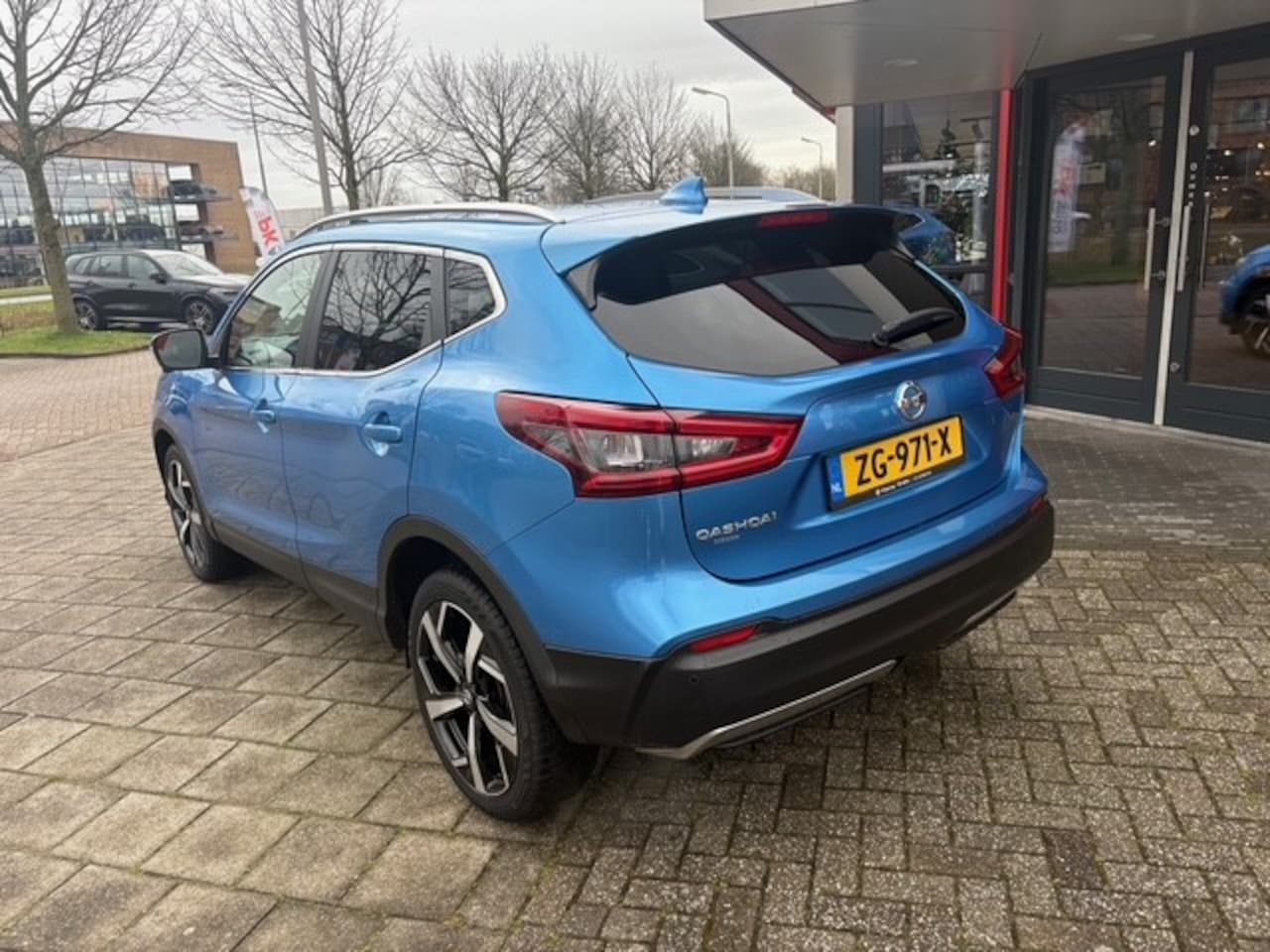 Nissan Qashqai - 1.2 Tekna | Navi | Pano | Cruise | 360 Camera | 77.696 km Dealeronderhouden - AutoWereld.nl