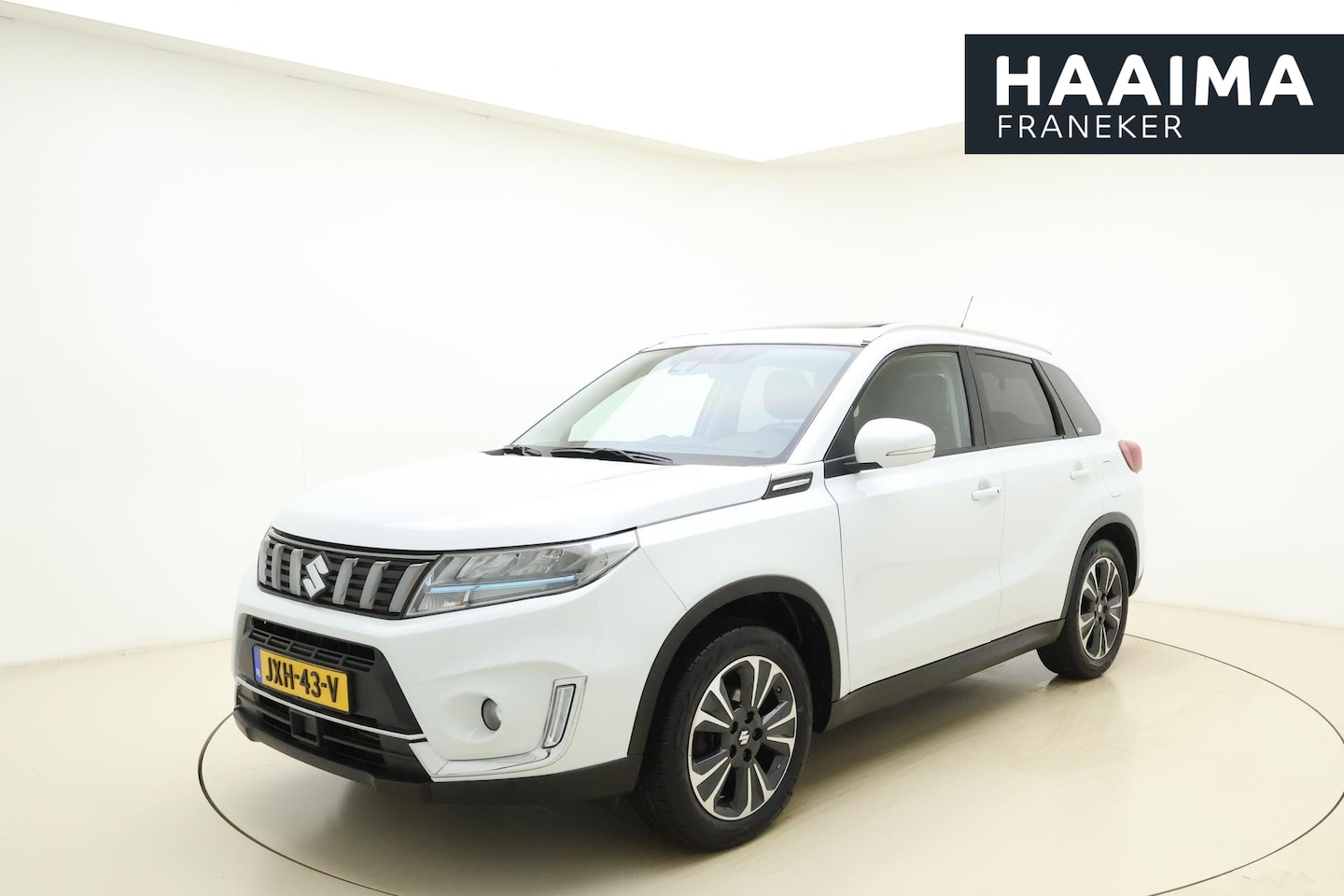 Suzuki Vitara - 1.4 Boosterjet Style Smart Hybrid AllGrip Automaat | Navigatie | Panoramisch schuif/kantel - AutoWereld.nl