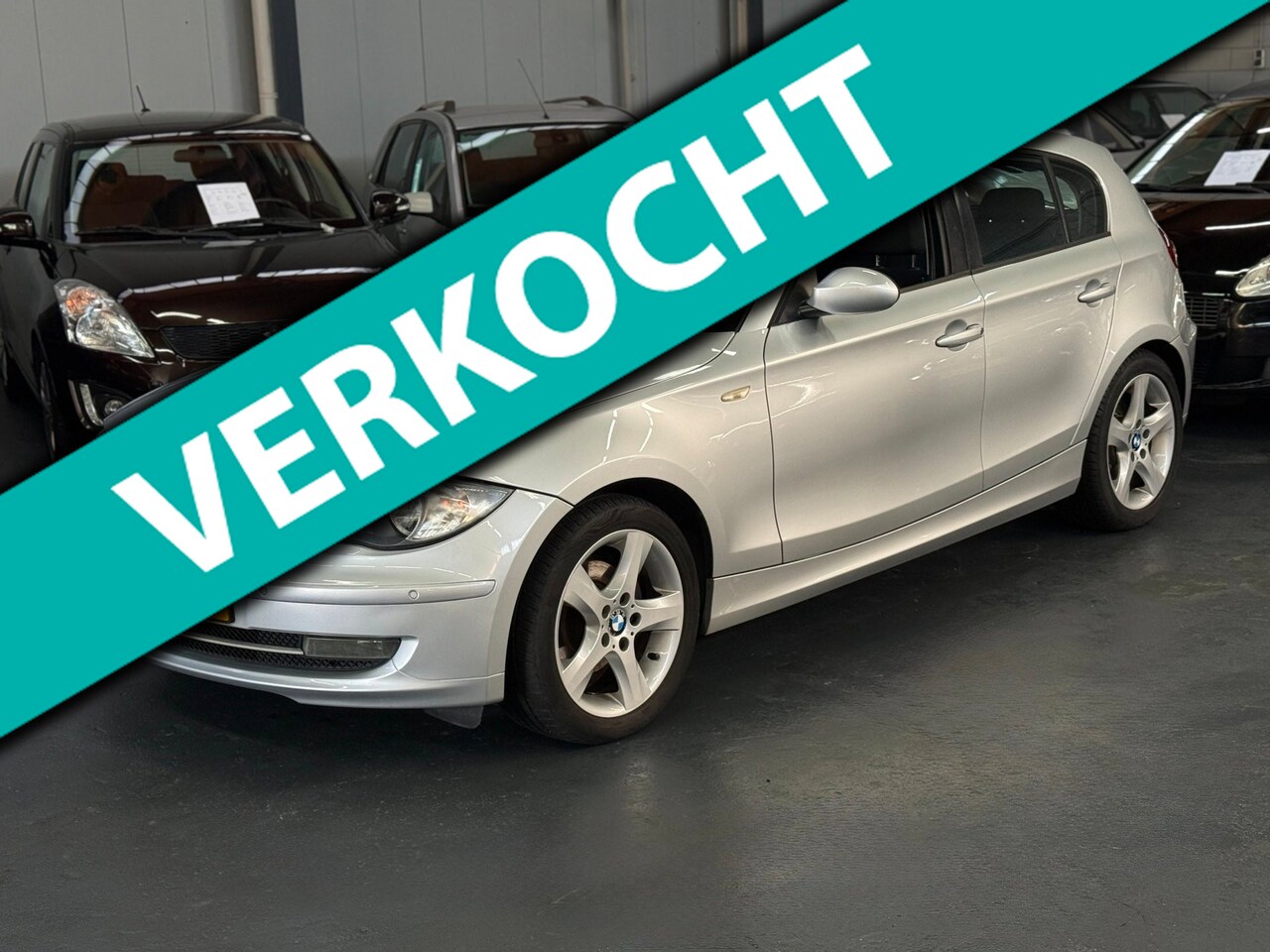 BMW 1-serie - 118i APK NAP Trekhaak Navi Stoelverwarming - AutoWereld.nl