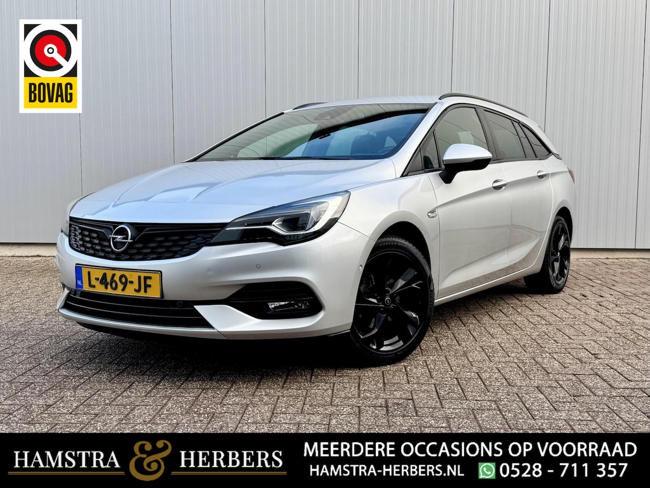 Opel Astra Sports Tourer - 1.2 Ultimate grijs - AutoWereld.nl