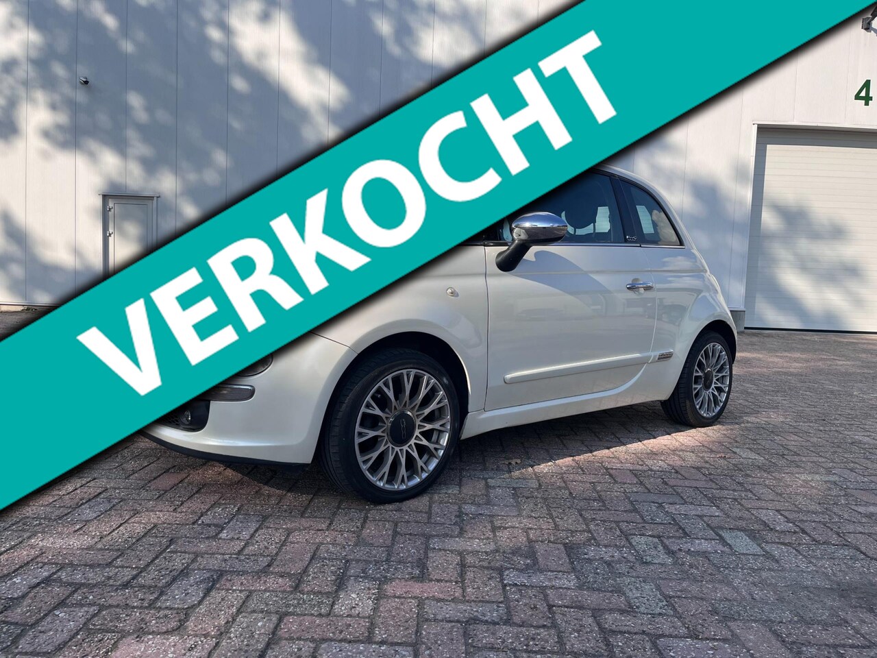 Fiat 500 C - 1.2 Rock open dak airco 2010 NL auto apple carplay navigatie - AutoWereld.nl