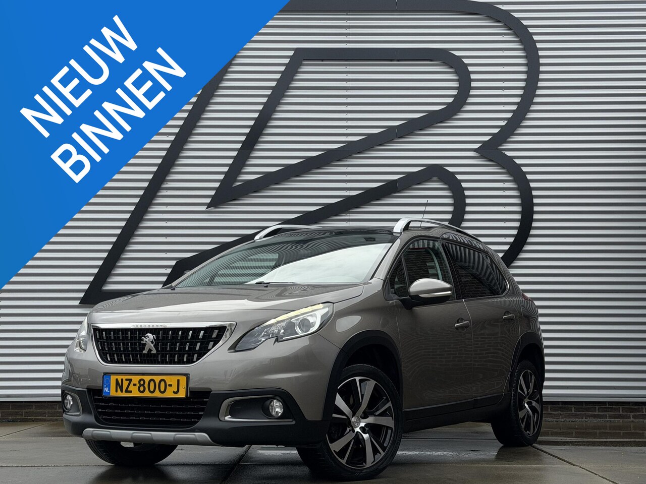 Peugeot 2008 - 1.2 PureTech Allure 2e Eigenaar|Navi|Pano|Clima|Cruise|PDC|Carplay|N.A.P|Nieuwe APK bij Af - AutoWereld.nl