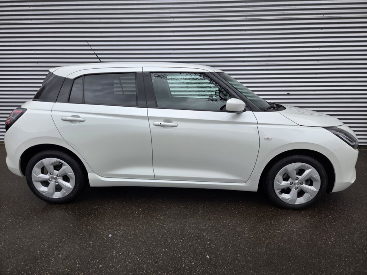 Suzuki Swift - 1.2 Select Sm.Hyb. - AutoWereld.nl