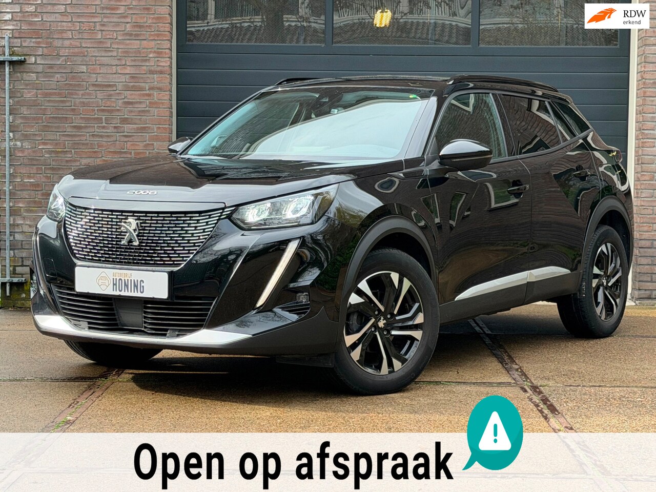 Peugeot 2008 - Allure Pack 130pk | ACC | Keyless Entry | Stoelverwarming | 3D dashboard - AutoWereld.nl