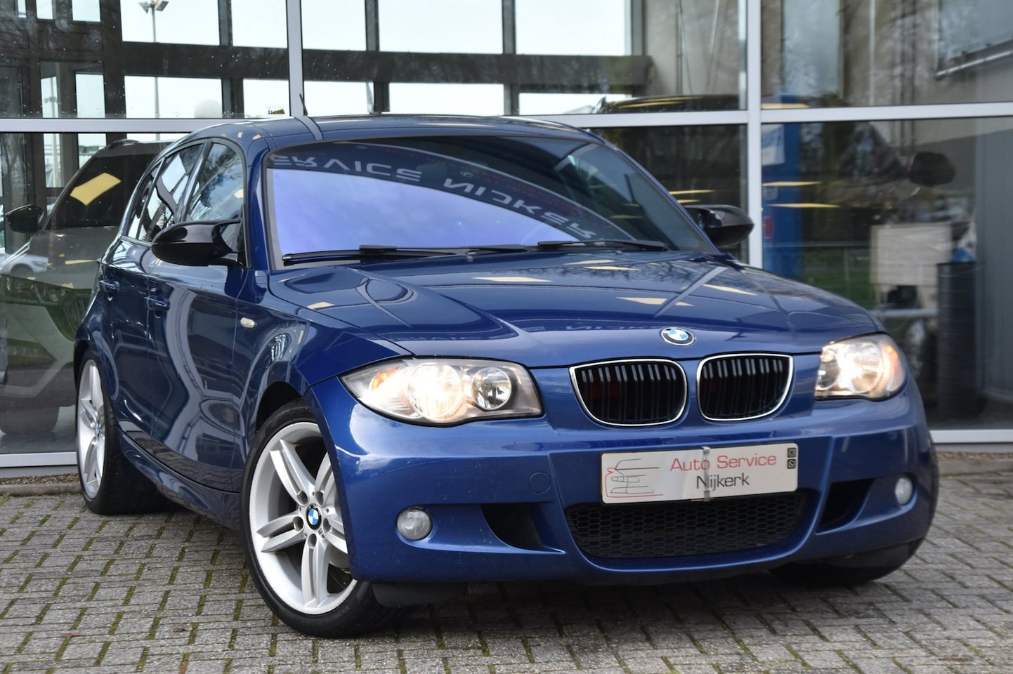 BMW 1-serie - 116i Business Line Sport Leder Pdc Nav. M-Pakket Led Carplay - AutoWereld.nl