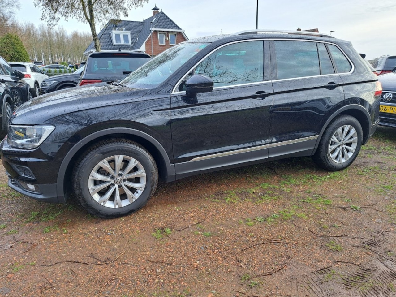 Volkswagen Tiguan - 1.5 TSI ACT 150 Pk Comfortl. Bs. Nav. Pdc Trekhaak - AutoWereld.nl