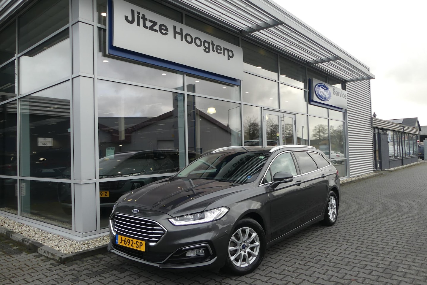 Ford Mondeo Wagon - 2.0 IVCT HEV Titanium ELEKT. TREKHAAK (750KG), WINTER PACK, MEMORY, CRUISE, CLIMA, NAVI, C - AutoWereld.nl