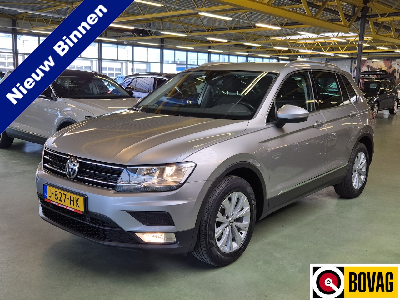 Volkswagen Tiguan - 1.4 TSI Comfortline -125pk-  Navi | Trekhaak | App-Connect | Rijklaarprijs incl. 1 jaar Bo - AutoWereld.nl