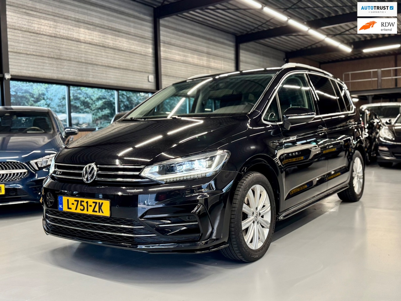Volkswagen Touran - 1.4 TSI R-LINE DSG Business 7p - AutoWereld.nl