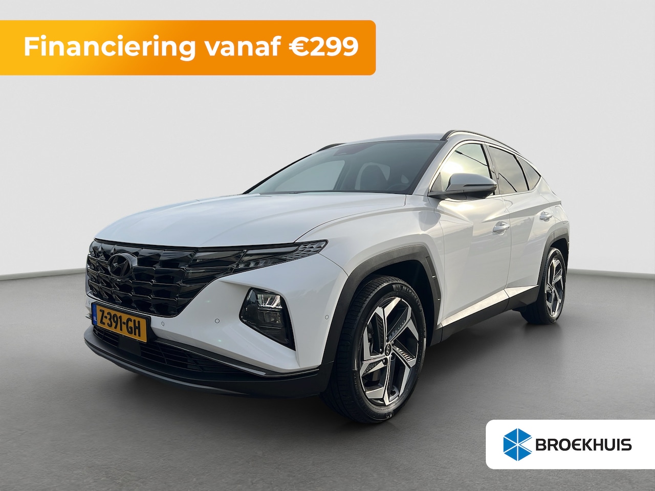 Hyundai Tucson - 1.6 T-GDI 265pk PHEV Premium 4WD (299,- p/m Demo Deal!) | Leder | Carplay | Climate | Trek - AutoWereld.nl