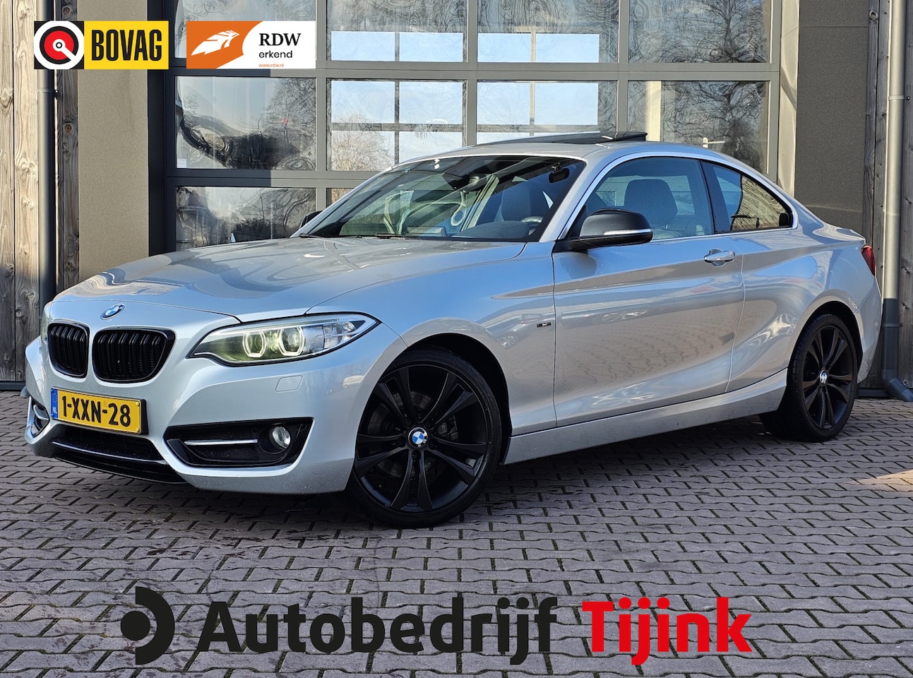 BMW 2-serie Coupé - 220i High Executive Sport | Automaat | Xenon | Leder | Stoelverwarming | Schuif/hef dak | - AutoWereld.nl