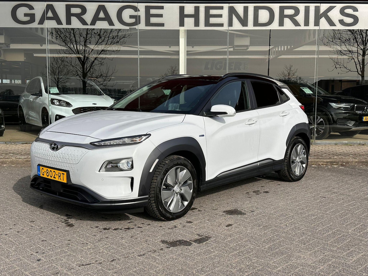 Hyundai Kona Electric - EV Premium 64 kWh | SOH: 91.9% | Leder | Blindspot |  LED | Adaptive CC | Two-Tone | - AutoWereld.nl